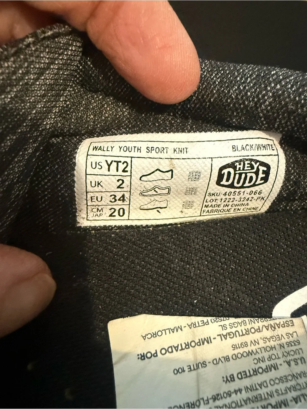 Hey Dude Wally Youth Sport Knit Slip-On in Black and White